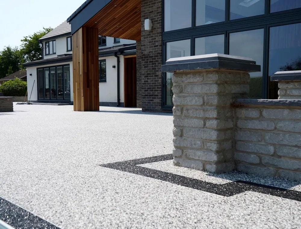 Contemporary resin-bound driveway and property entrance